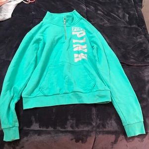 Teal (brand pink) pullover with gray writing